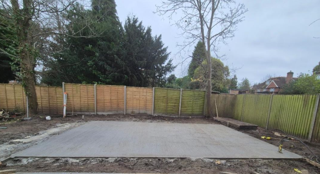Concrete base for outdoor structure